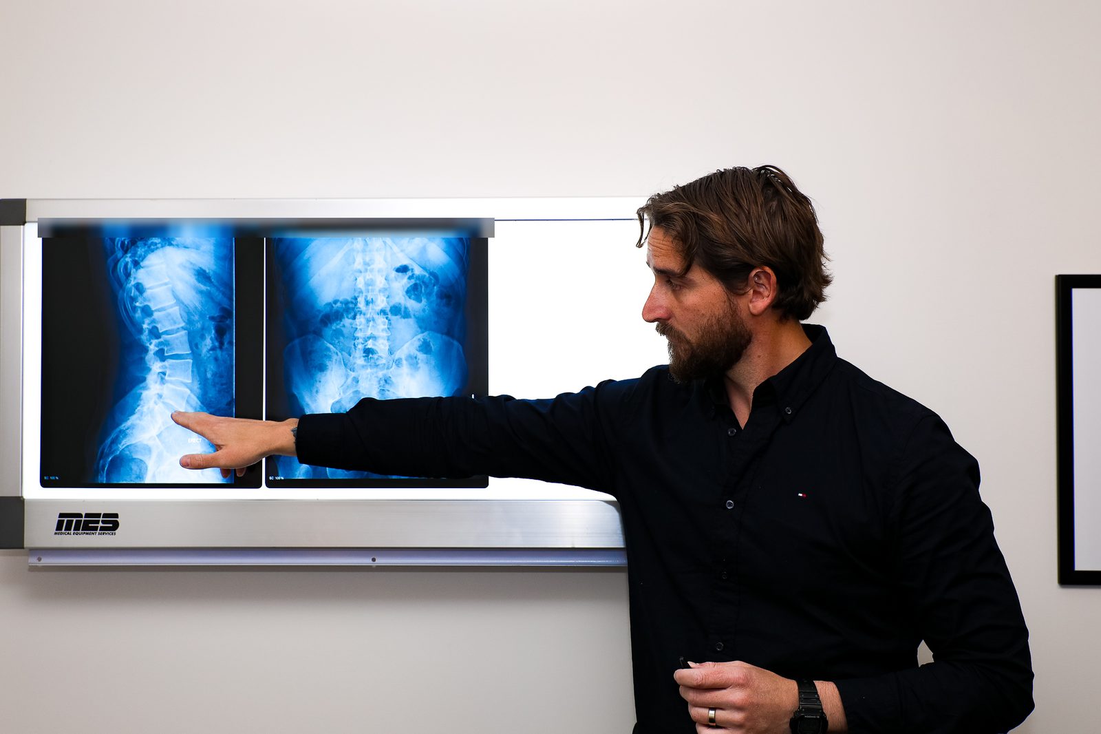 Dr Nick Ruffin reviewing spinal X-rays